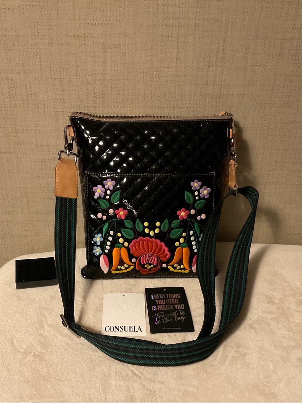 Consuela Black Quilted Crossbody with Multicolor Floral Appliqué
